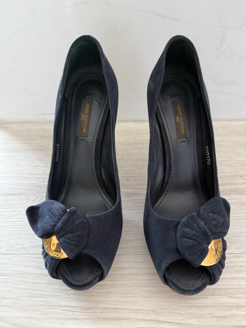 Louis Vuitton Black Peep-Toe Bow Pumps with Gold Medallion
